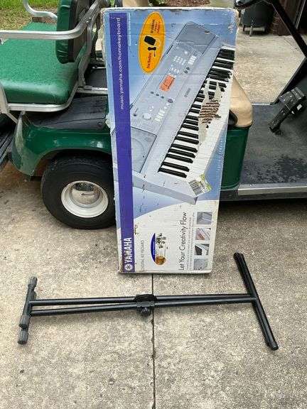 Yamaha digital keyboard with stand image