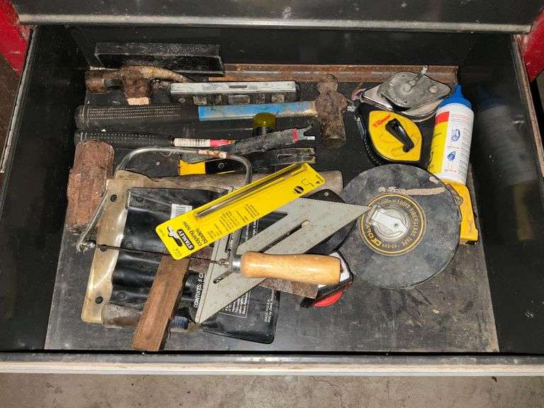 Hammers, measuring tapes, combination square, chisels, nail aprons, etc. image