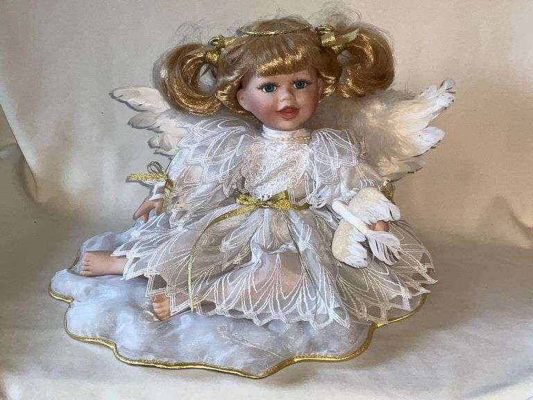 Baby's Dream doll on cloud image