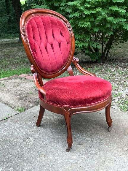 Red upholstered Queen Anne style chair image