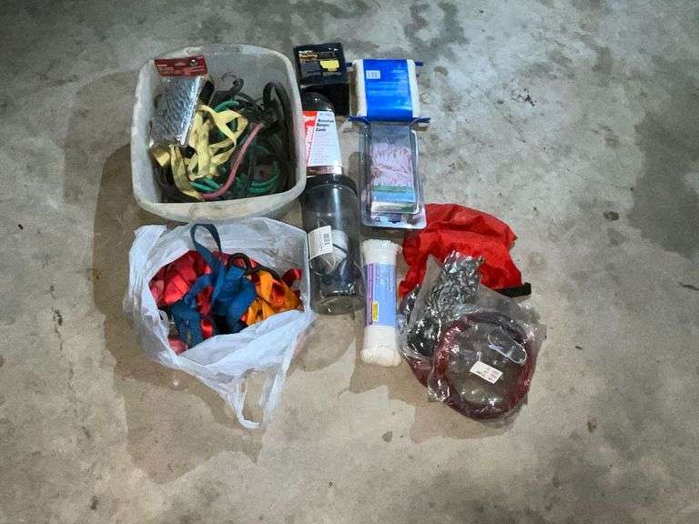 Assortment of bungee cords, tie down straps, rope, etc. image