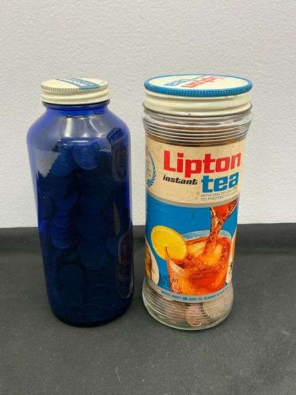 Pair of jars of pennies image