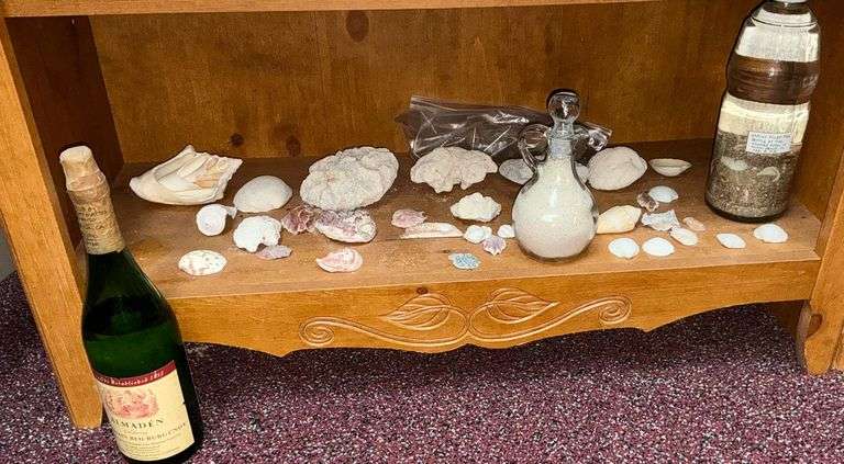 Pacific Ocean water in a bottle, shells and sand image