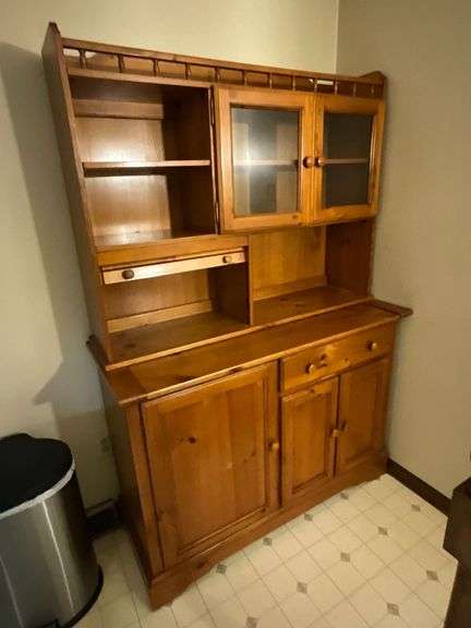 Two-piece wooden china hutch with pull out counter image
