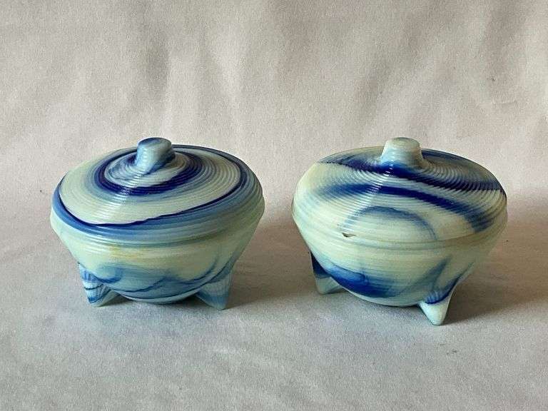 Pair of Akro Agate footed powder jars, blue and white, one with chip on rim image