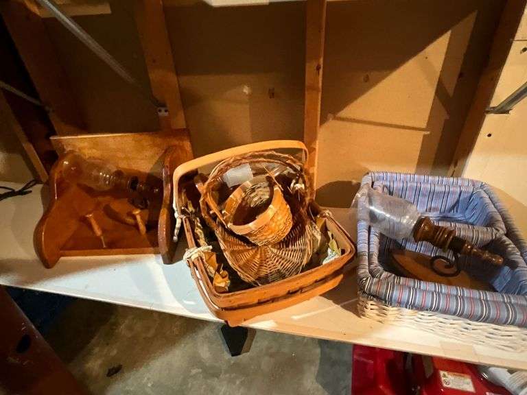 Wooden shelf, woven baskets image