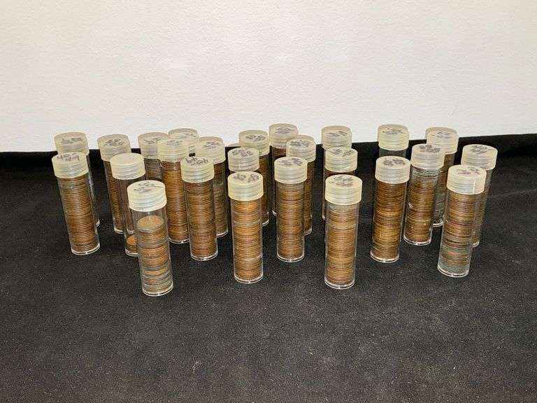 Assorted plastic tubes of pennies image