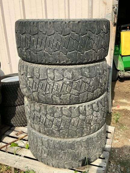 Set of Dick Cepek Fun Country LT305-55220 tires, about half tread image