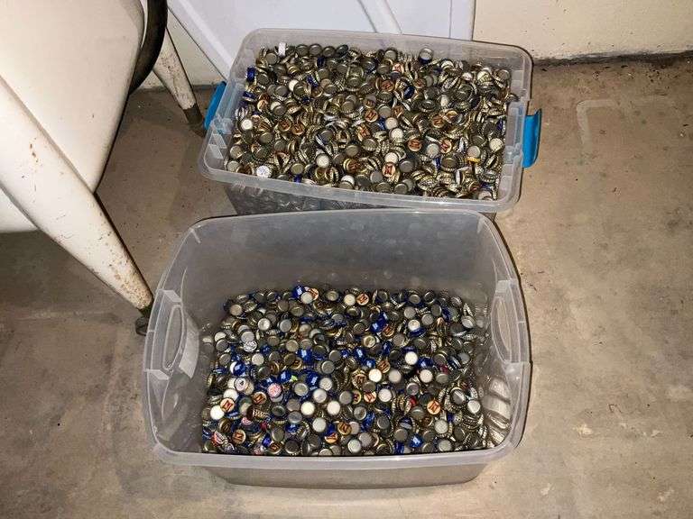 Large collection of beer bottle caps in totes image