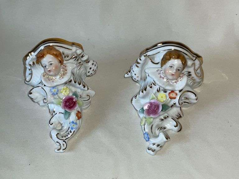 Pair of Limoges cherub sconces image