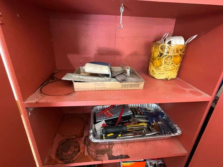 Assortment of tools, ropes, sockets, screwdriver, hammer, staple gun image