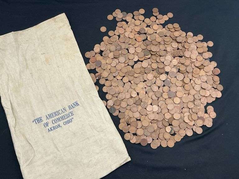Collection of wheat pennies in "The American Bank of Commerce" Akron, Ohio canvas bank bag image