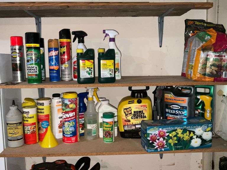 Top 2 shelves of garden chemicals image