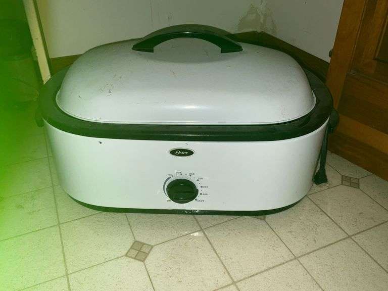 Oster roaster with tray inserts image