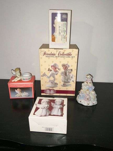 Porcelain Collectible skating boy and girl image