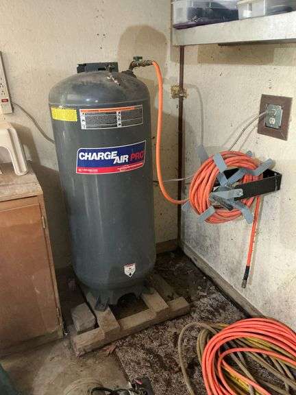 60 gallon air tank, hose reel and hose. image