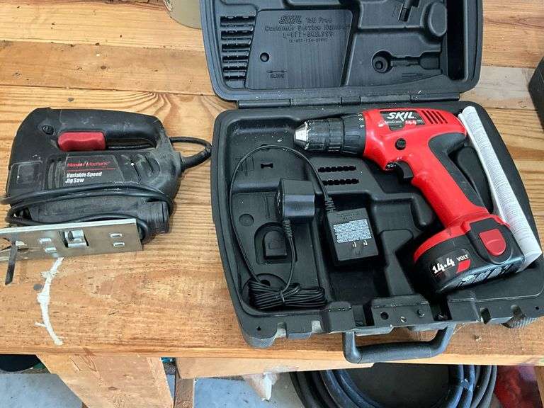 Skil 14.4 V drill and Master Mechanics variable speed jigsaw image