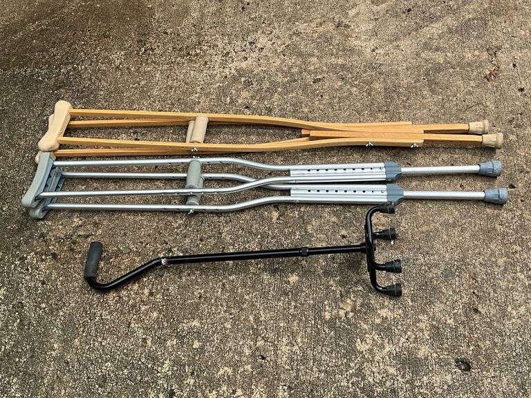 2 pairs of crutches and quad cane image