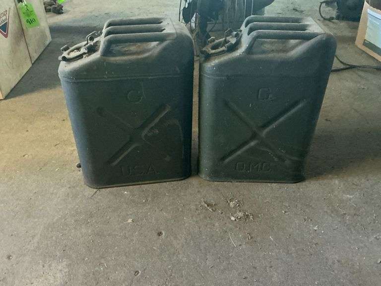(2) 5-gallon metal Jerry cans. image