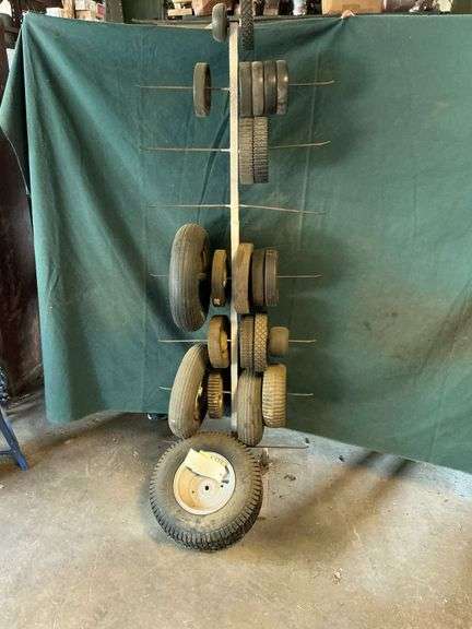 Rack of new and used tires image