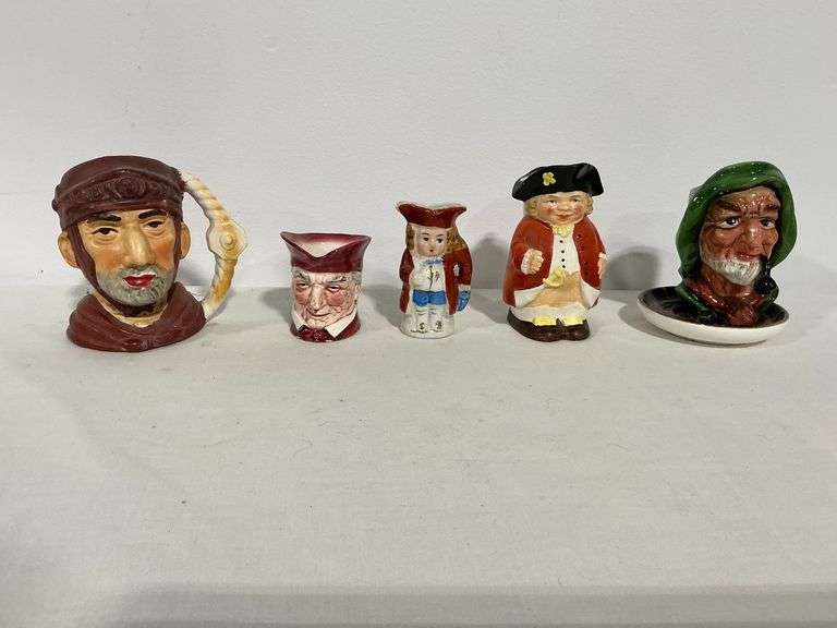 Toby ash tray with small chip and repair to pipe image