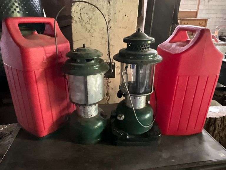 Pair of Coleman lanterns with carrying cases image