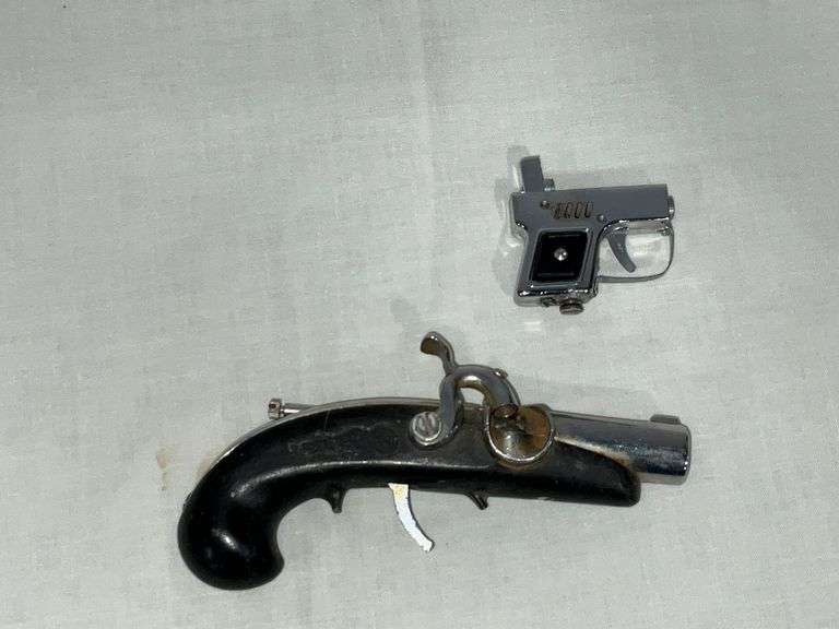 Pair of pistol lighters image
