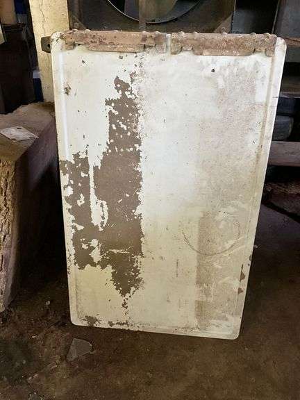 Enamel counter top from Hoosier cabinet with metal brackets image