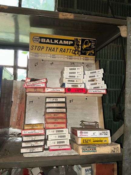 NAPA Balkamp muffler clamp rack and contents image
