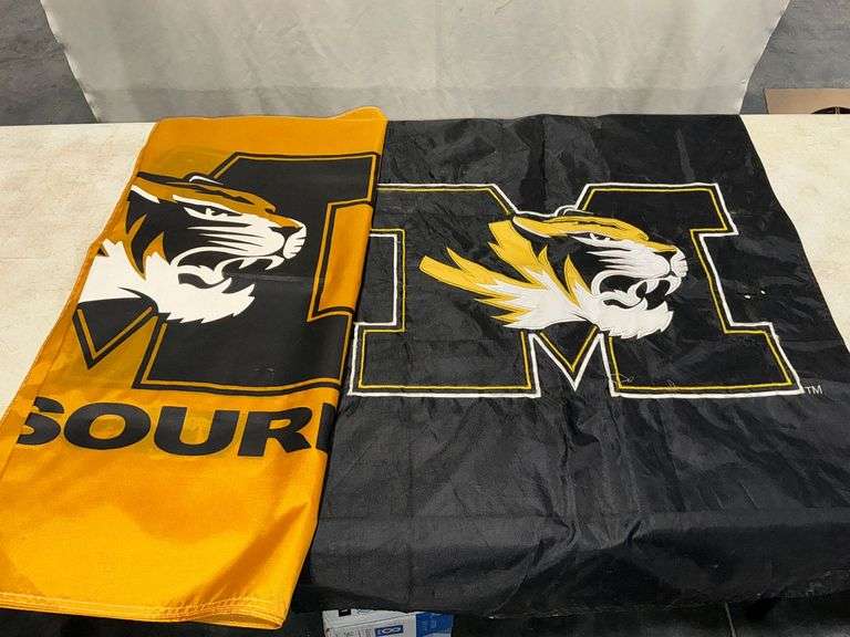 Pair of Mizzou flags, black one with damage image