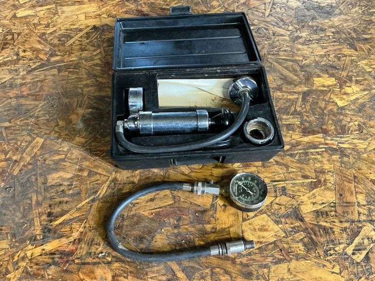 Stant cooling system pressure tester, engine compression tester image