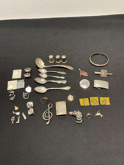 Sterling pieces, spoons, tie clasp, shakers, matchbox cover, pins, cuff links, pendant, etc. image