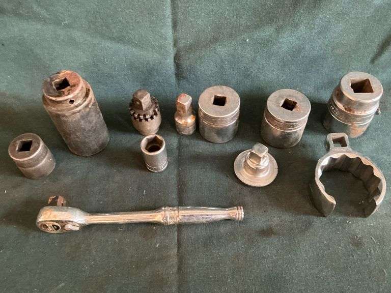 Snap-On 1/2" drive ratchet, 1/2" and 3/4" drive sockets, crows foot, etc. image