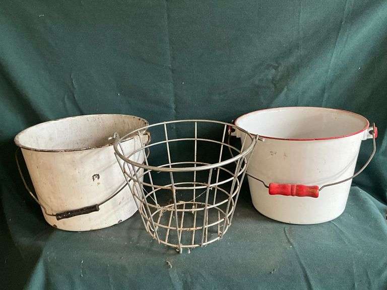 Enamel and wire buckets. image