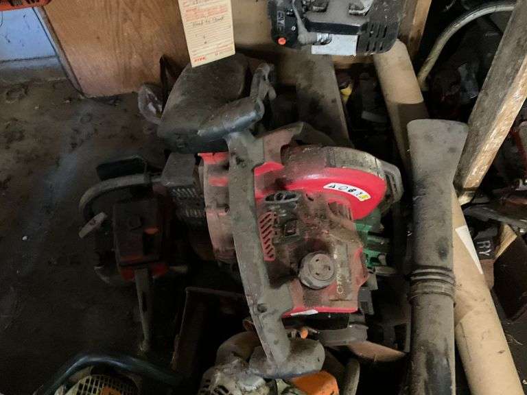 Assortment of chop saws, leaf blowers, trimmers image