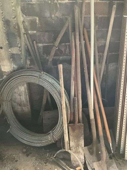 Long handled tools, roll of steel cable image