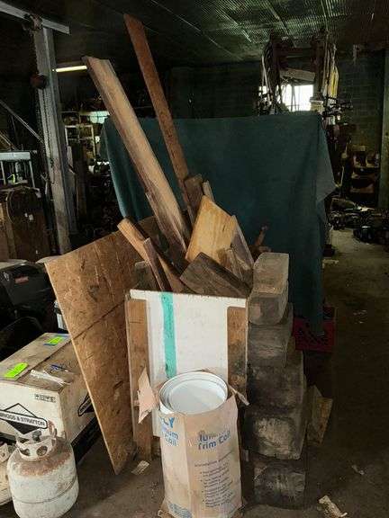 Large box of assorted lumber, roll of trim coil image