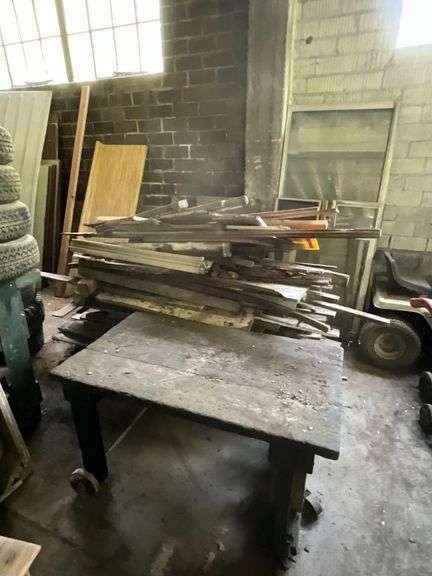 Heavy wooden table with cast rollers, wooden windows, counter top image