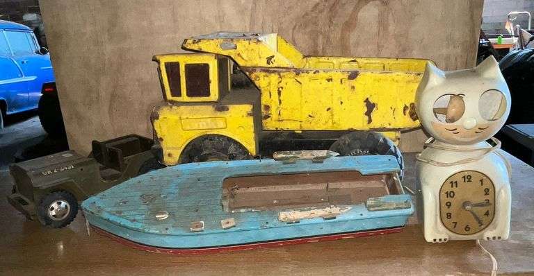 Tonka dump truck, Jeep, wooden motor boat image