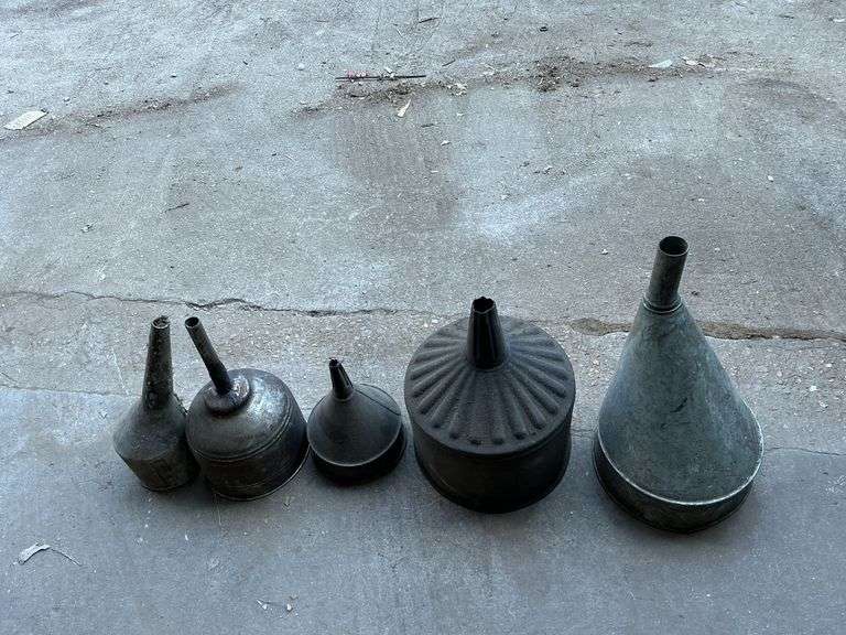 Vintage metal funnels. image