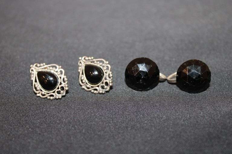 2 Pair of Sterling Silver earrings, both with black colored stones, one pair has screw backs. image