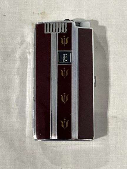 Ronson cigarette case with flip top lighter image