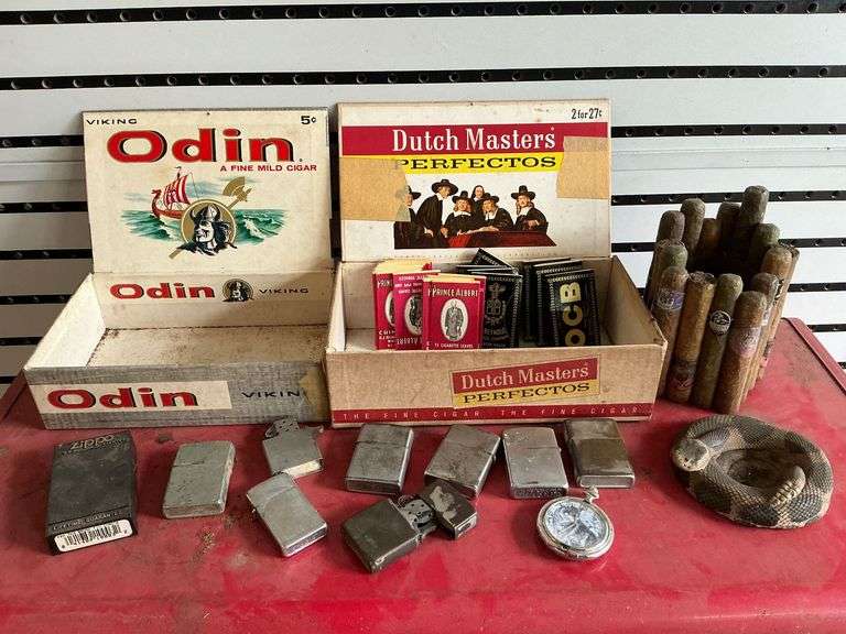 Cigar pencil holder, cigar boxes, Zippo lighters (all rough) image