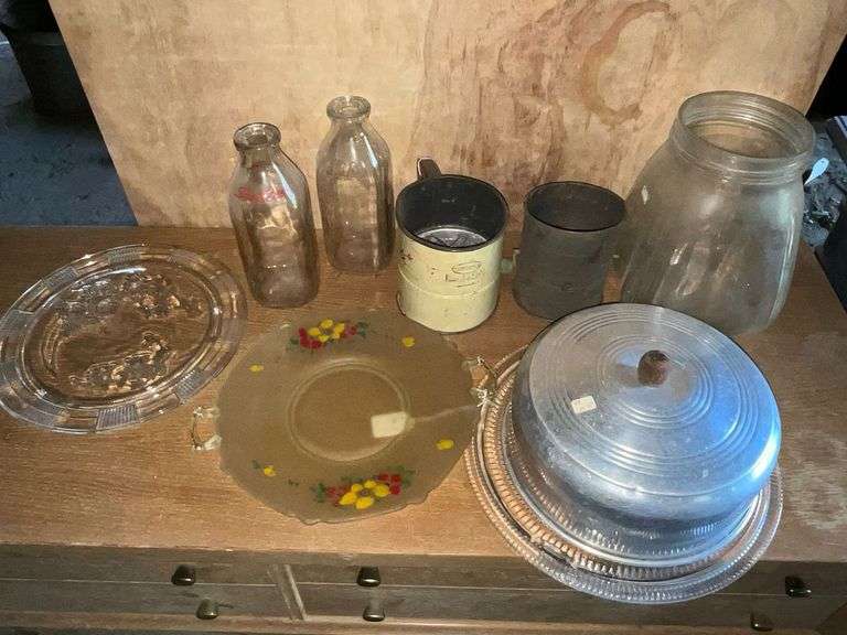 2 milk bottles, covered cake plate, butter churn jar image