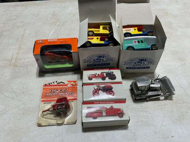 Pewter bulldozer with damage, die cast trucks, farm implements and fire trucks image