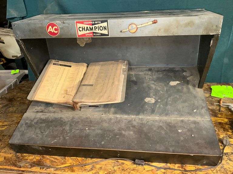 Metal flip-top counter top parts book caddy, lighted image