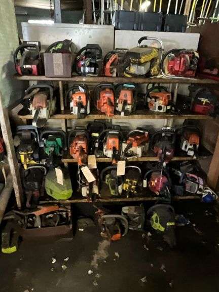 Shelves of used chainsaws image