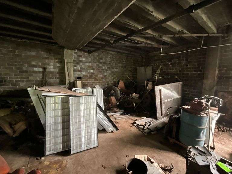 Car lift, bucket seat, small block chevy motor, tires and wheels image