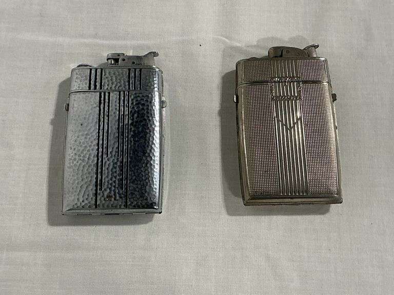 Pair of Evans cigarette cases with flip top lighters image