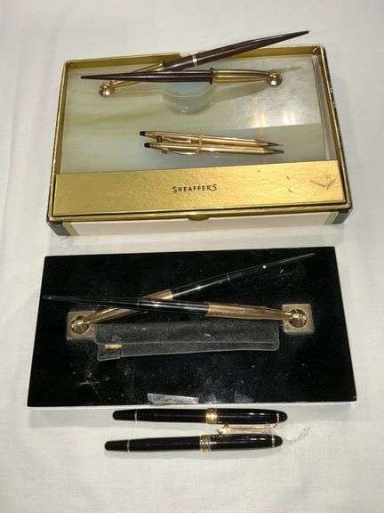 Sheaffer's and other pen and pencil sets in marble holders image